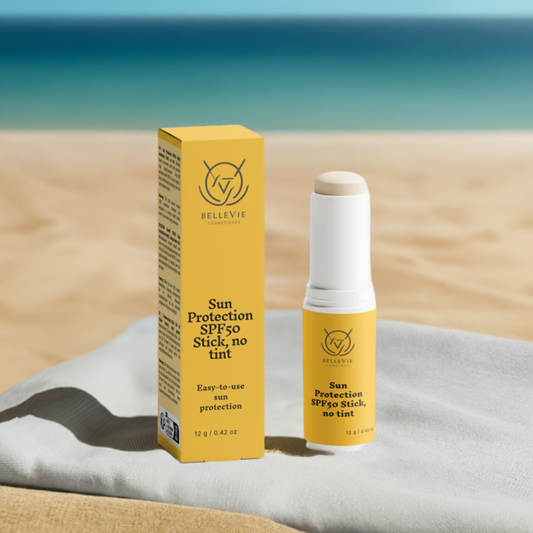Woman applying BelleVie Cosmétiques face cream for sun protection